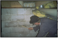 Radon Techniques for New Home Construction: guy with a brush